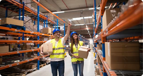 Warehouse workers with packages