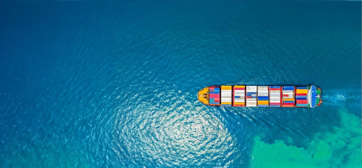 Aerial view of cargo ship with containers