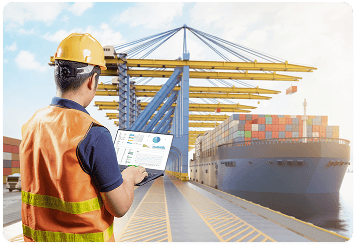 Logistics professional with tablet at shipping yard